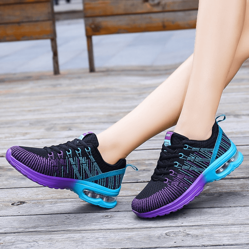 Stylish Bright Mesh Women's Sneakers in black and purple, breathable sports shoes with lightweight EVA outsole for active wear.